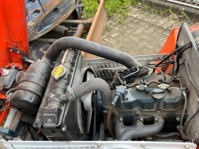 KUBOTA Trecker 1400 mit Zapfwelle am Heck und Heuwender